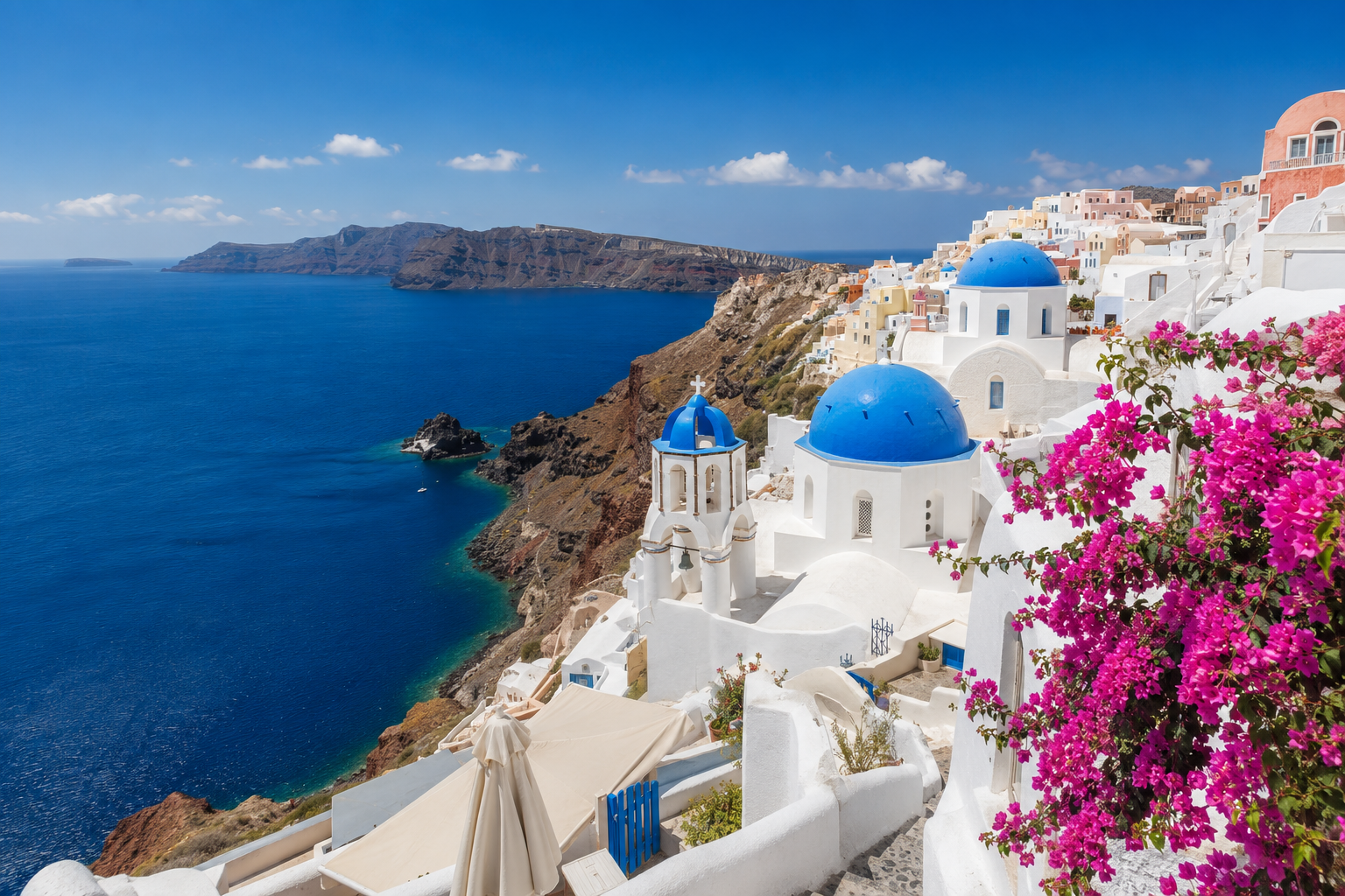 Whitewashed Greek island village overlooking the Aegean Sea